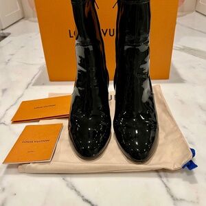 **** SOLD ****.  Louis Vuitton Patent Leather Boots W/Logo Leather Heel.